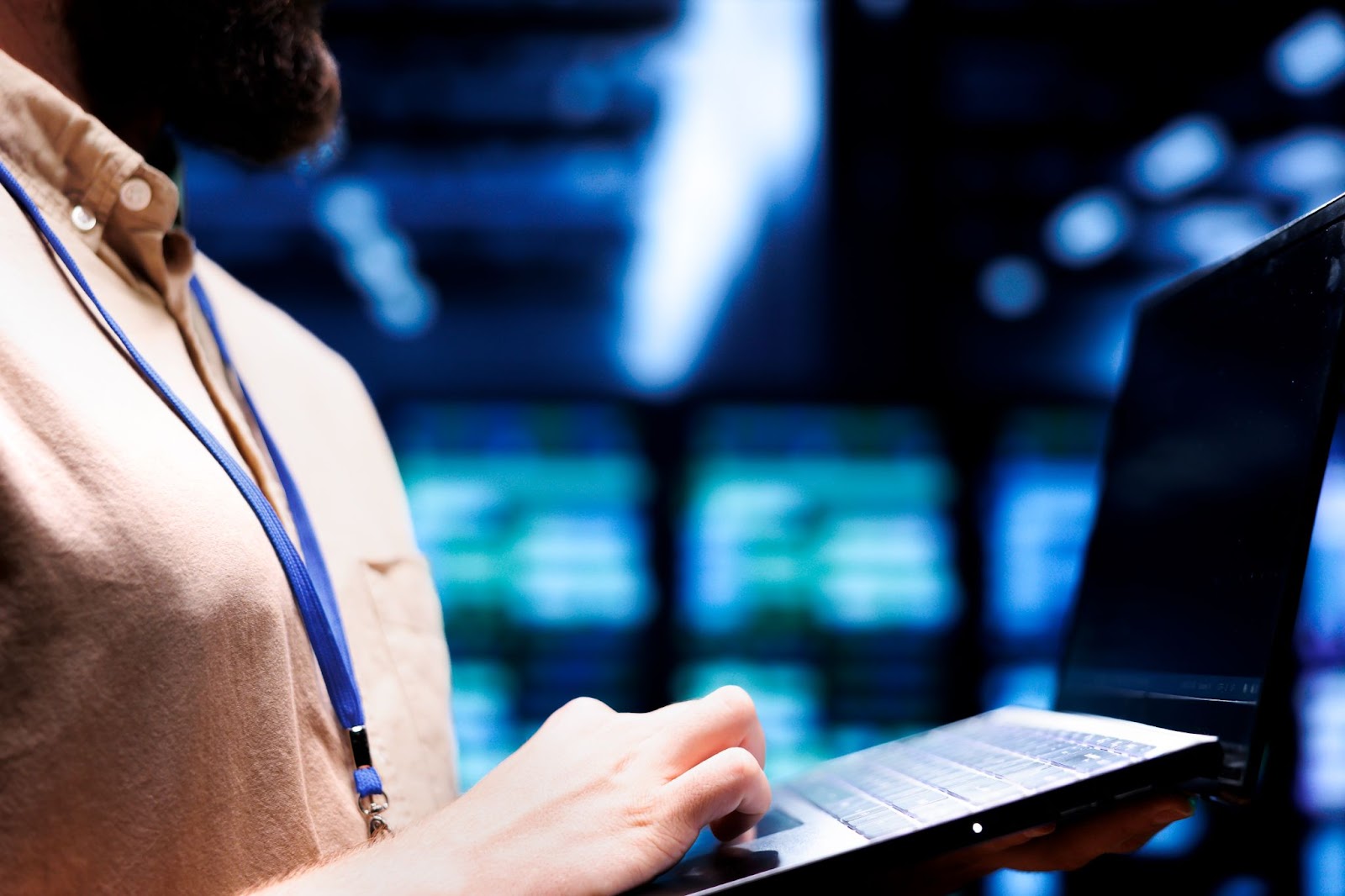 Close up of man using his laptop